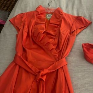 Elizabeth McKay bright orange wrap dress